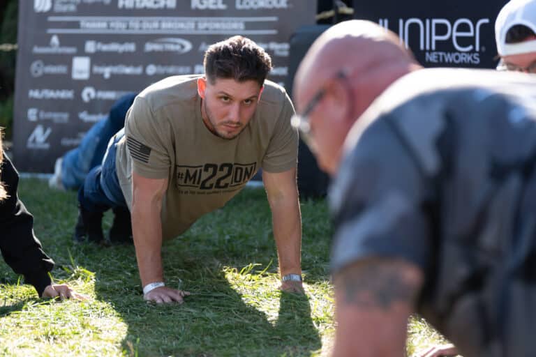 Participant completing a physical fitness challenge during a Mission 22 fundraiser.